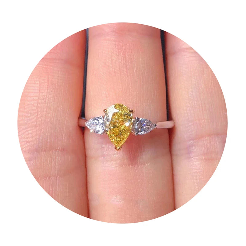 1ct. Pear Yellow VVS Moissanite 18K White Gold Ring