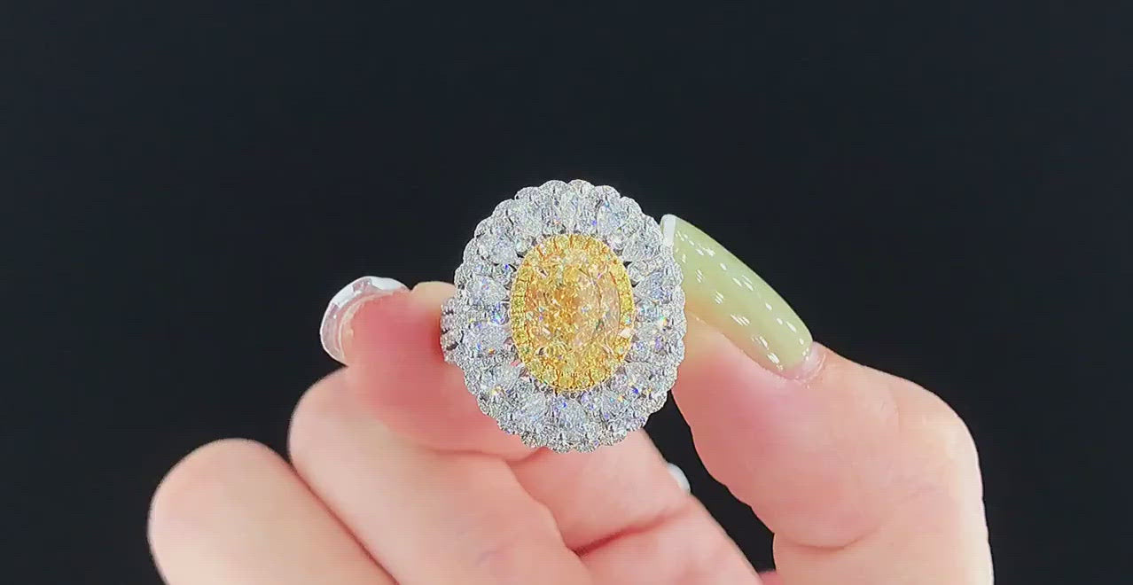 Load video: Oval Shaped Yellow Diamond Ring | Zupstyle